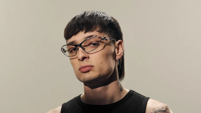 What does the Peso Pluma Hair Cut mean e1758186979940